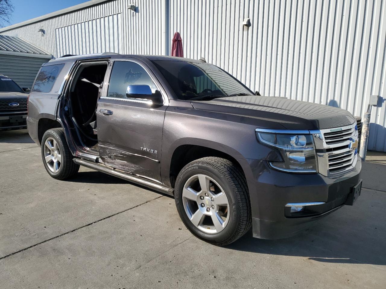 2015 Chevrolet Tahoe VIN 1GNSKCKC0FR118718 Copart auction photo, frame damage / side damage thumbnail 4