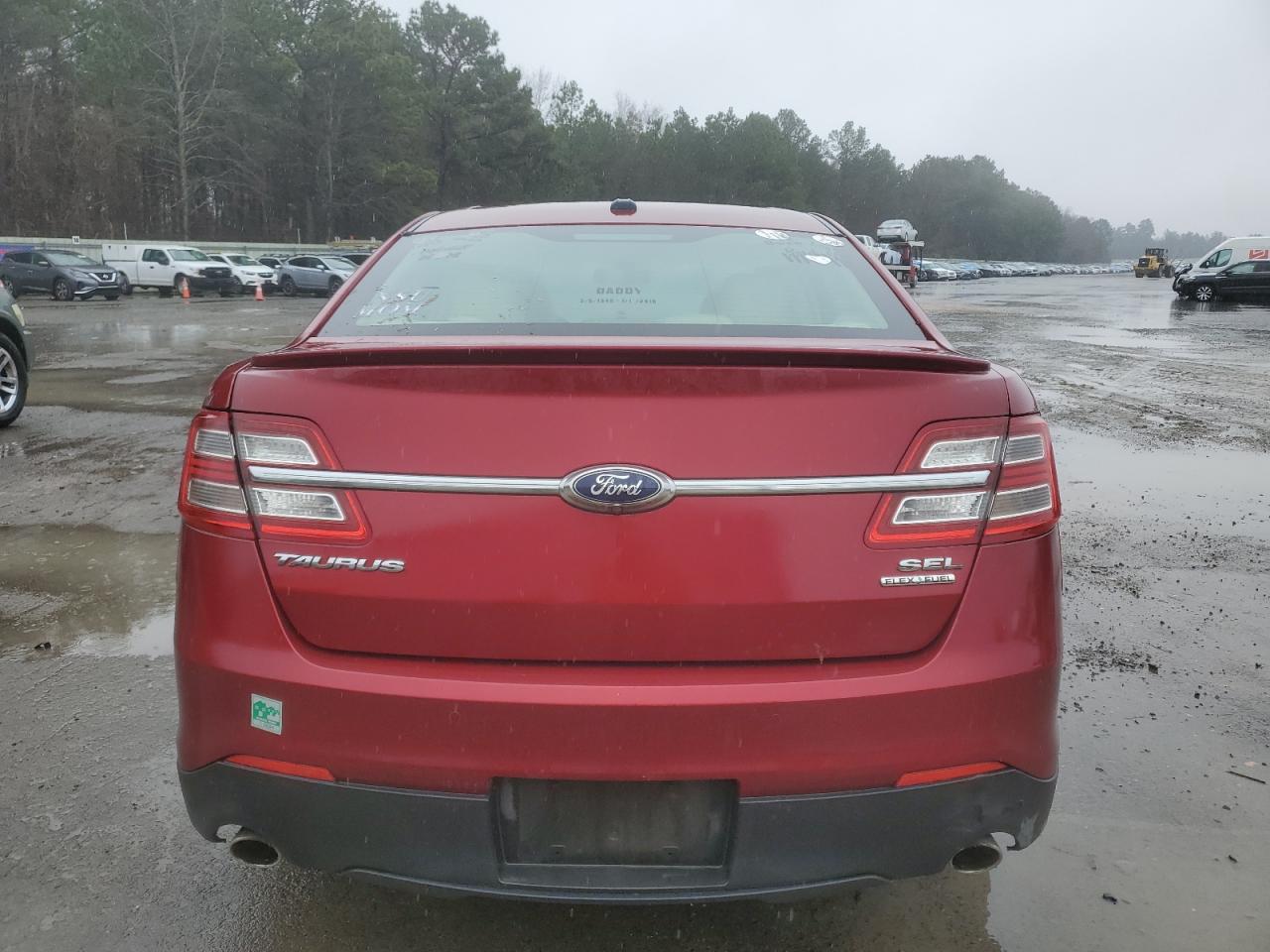 2014 Ford Taurus VIN 1FAHP2E83EG139570 Copart auction photo, front end / minor dent/scratches damage thumbnail 6
