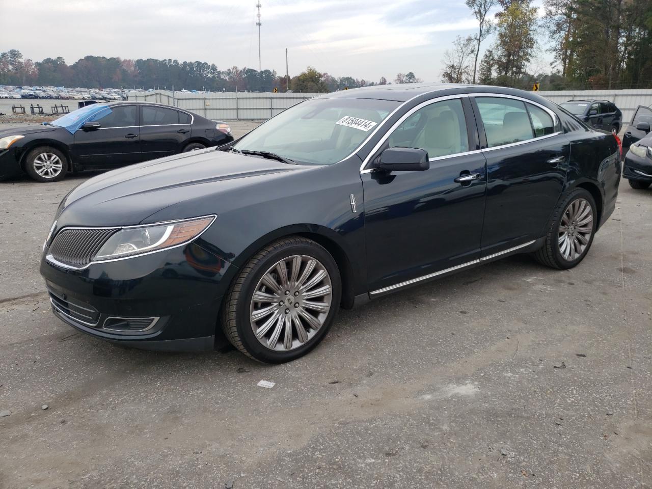 2014 Lincoln MKS VIN 1LNHL9DK1EG604838 - Copart auction photo