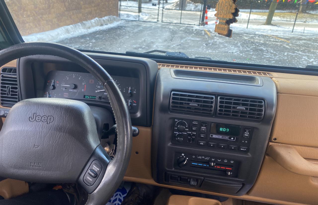 1998 Jeep Wrangler VIN 1J4FY49S6WP721433 Copart auction photo, normal wear damage thumbnail 9