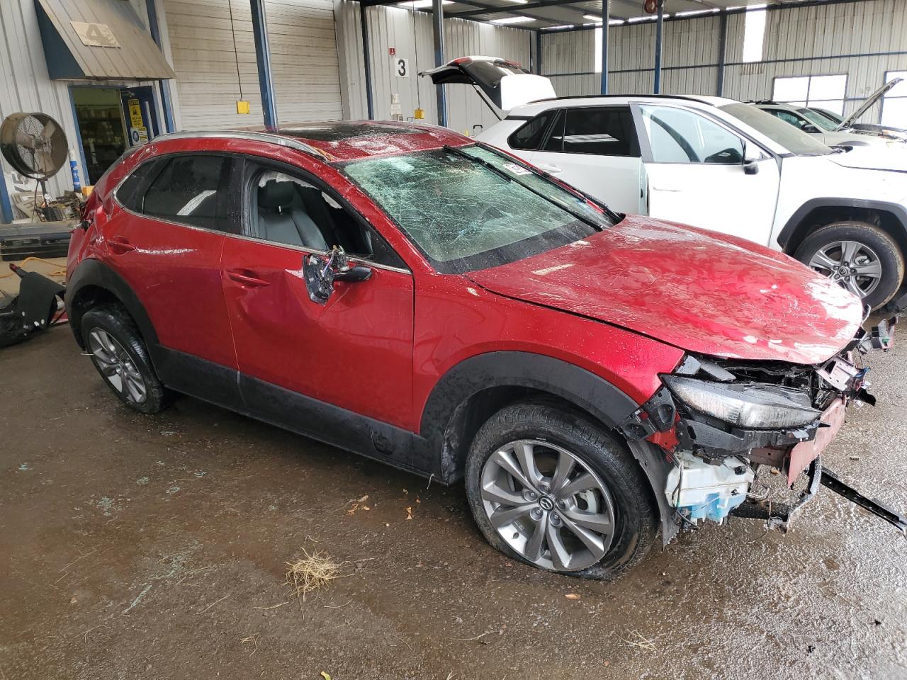 2023 Mazda CX-30 VIN 3MVDMBDM0PM527234 Copart auction photo, front end / all over damage thumbnail 4
