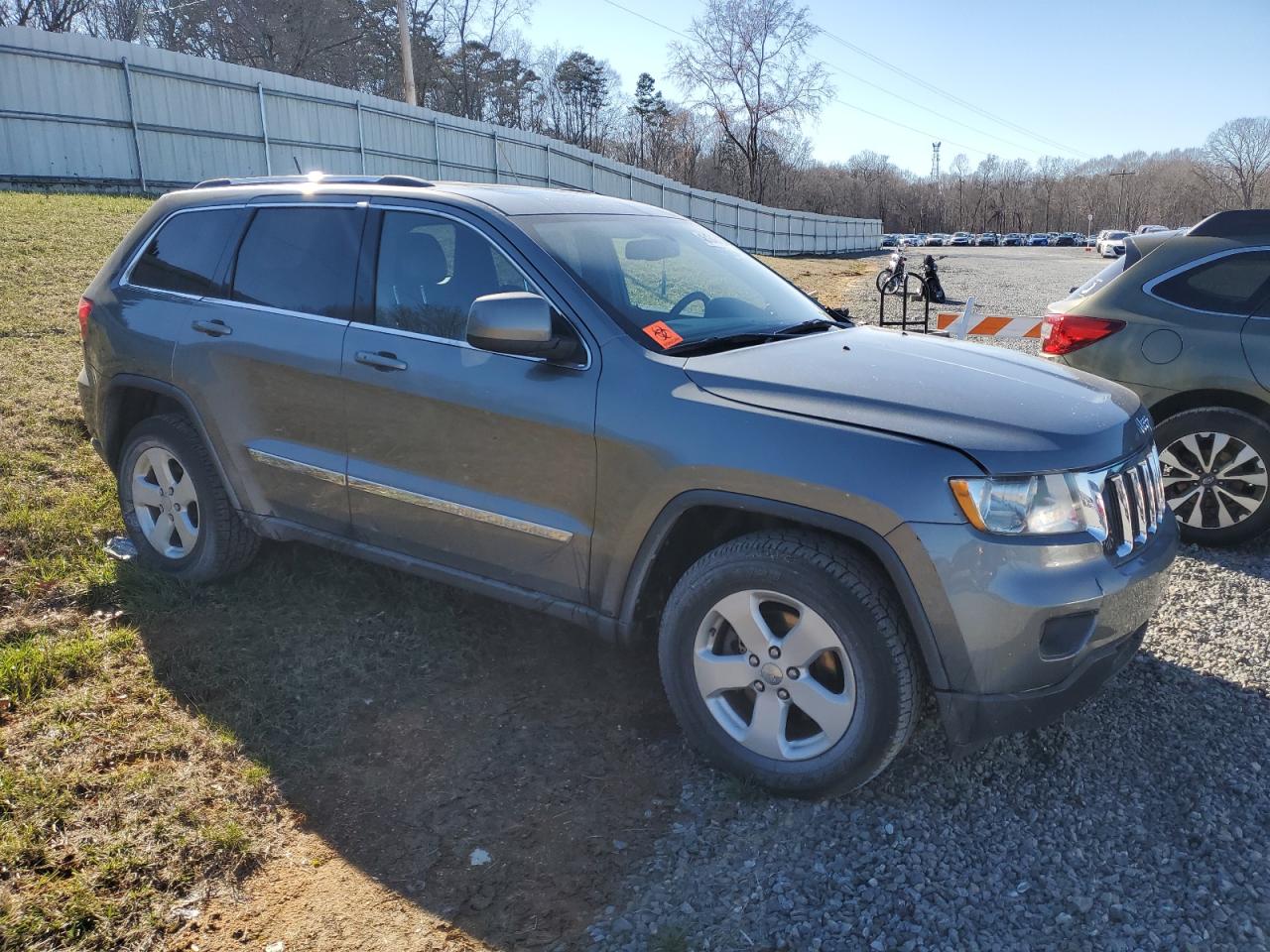 2012 Jeep Grand Cherokee VIN 1C4RJFAG7CC299315 Copart auction photo, front end damage thumbnail 4