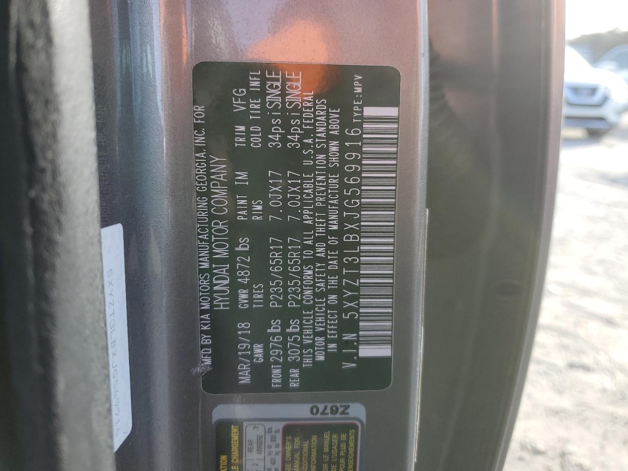 2018 Hyundai Santa Fe VIN 5XYZT3LBXJG569916 Copart auction photo, rear end damage thumbnail 13