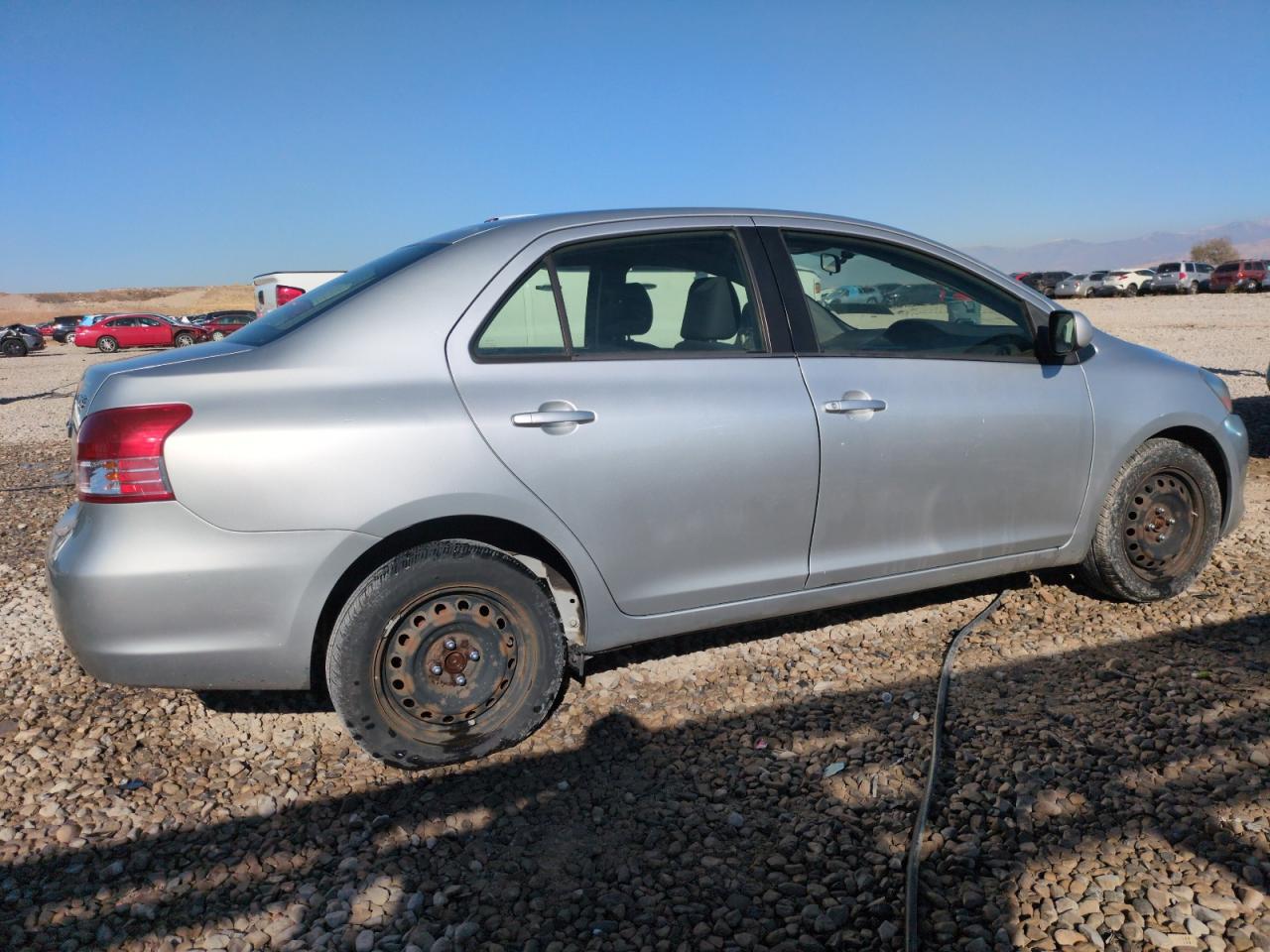 2012 Toyota Yaris VIN JTDBT4K36CL038396 Copart auction photo, side / front end damage thumbnail 3
