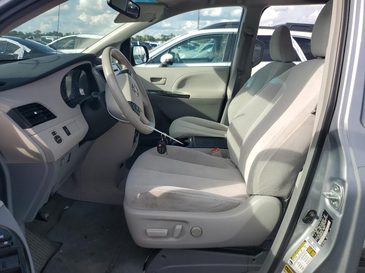 2014 Toyota Sienna VIN 5TDKK3DC7ES413059 Copart auction photo, water/flood damage thumbnail 7