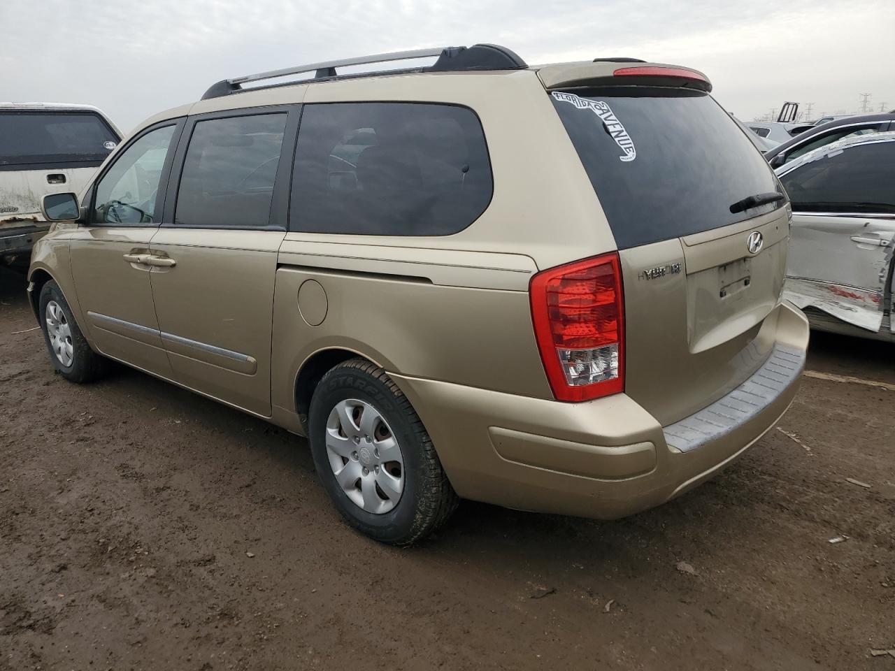 2007 Hyundai Entourage VIN KNDMC233476034055 Copart auction photo, front end / minor dent/scratches damage thumbnail 2
