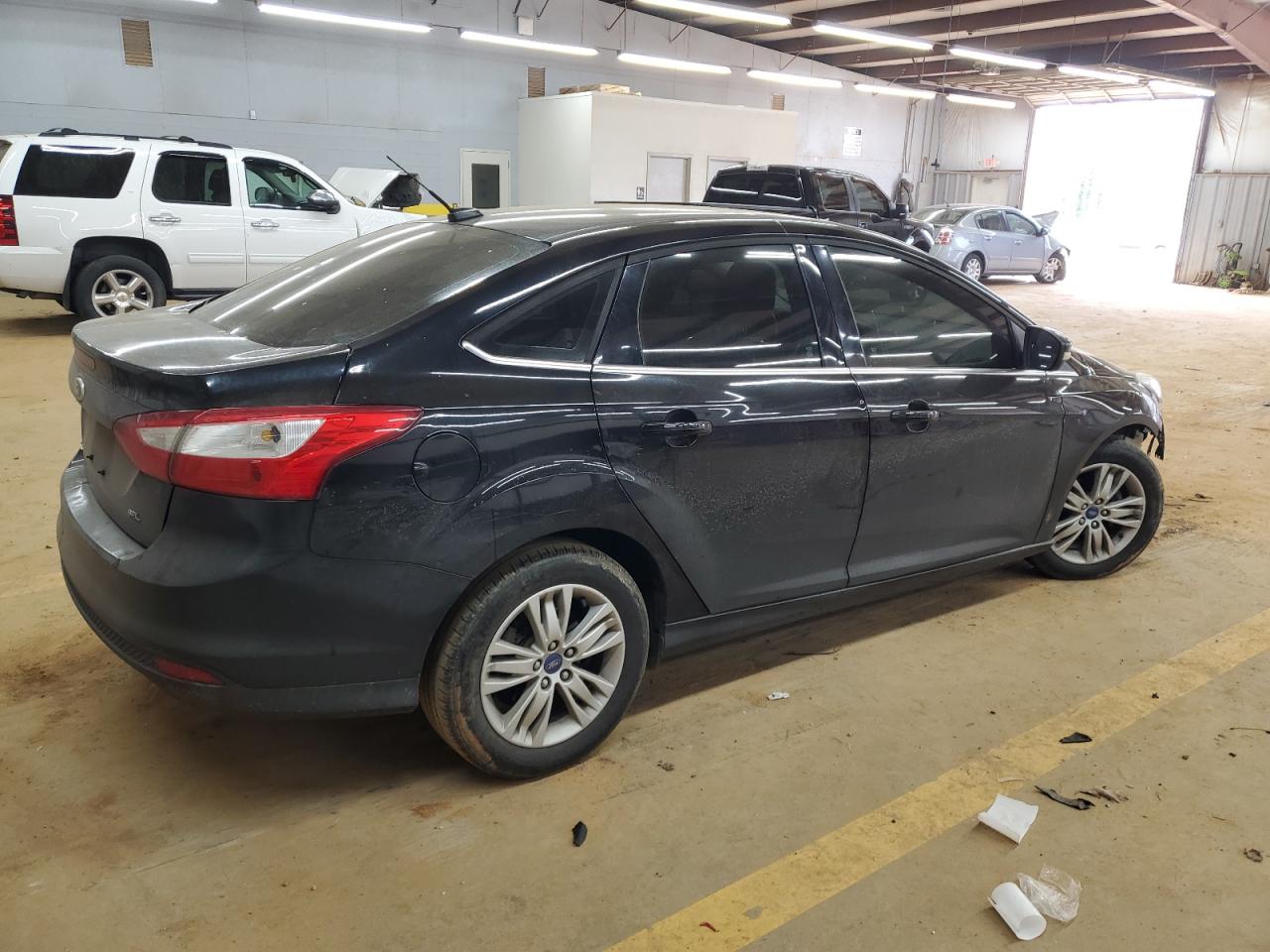 2012 Ford Focus VIN 1FAHP3H27CL252584 Copart auction photo, front end / undercarriage damage thumbnail 3