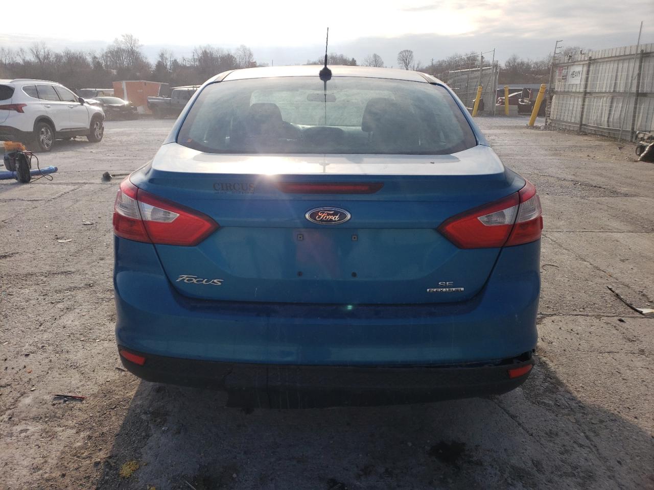2014 Ford Focus VIN 1FADP3F23EL293394 Copart auction photo, front end / minor dent/scratches damage thumbnail 6