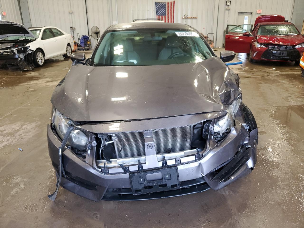 2018 Honda Civic VIN 19XFC2F55JE019698 Copart auction photo, front end damage thumbnail 5