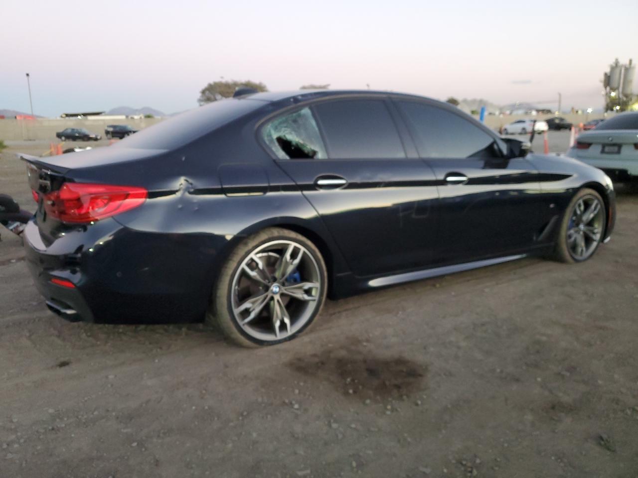 2018 BMW M5 VIN WBAJB9C5XJB036002 Copart auction photo, vandalism damage thumbnail 3