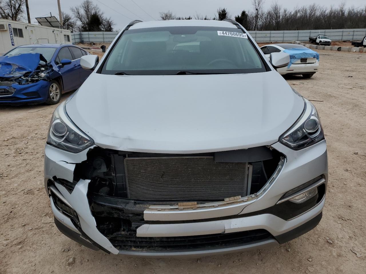 2017 Hyundai Santa Fe VIN 5XYZU3LB1HG447369 Copart auction photo, front end / minor dent/scratches damage thumbnail 5