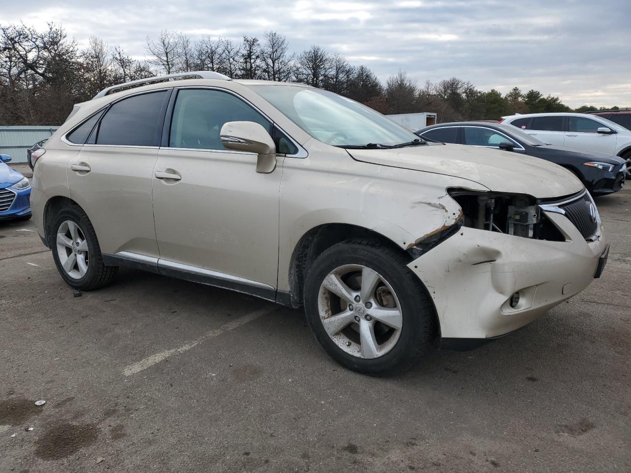 2011 Lexus RX VIN 2T2BK1BA2BC092652 Copart auction photo, front end / minor dent/scratches damage thumbnail 4