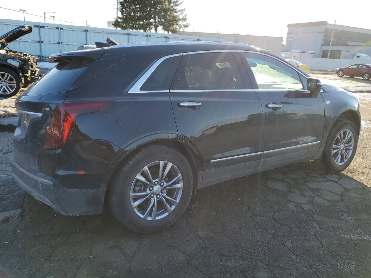 2021 Cadillac XT5 VIN 1GYKNDRS6MZ111640 Copart auction photo, side / rear end damage thumbnail 3