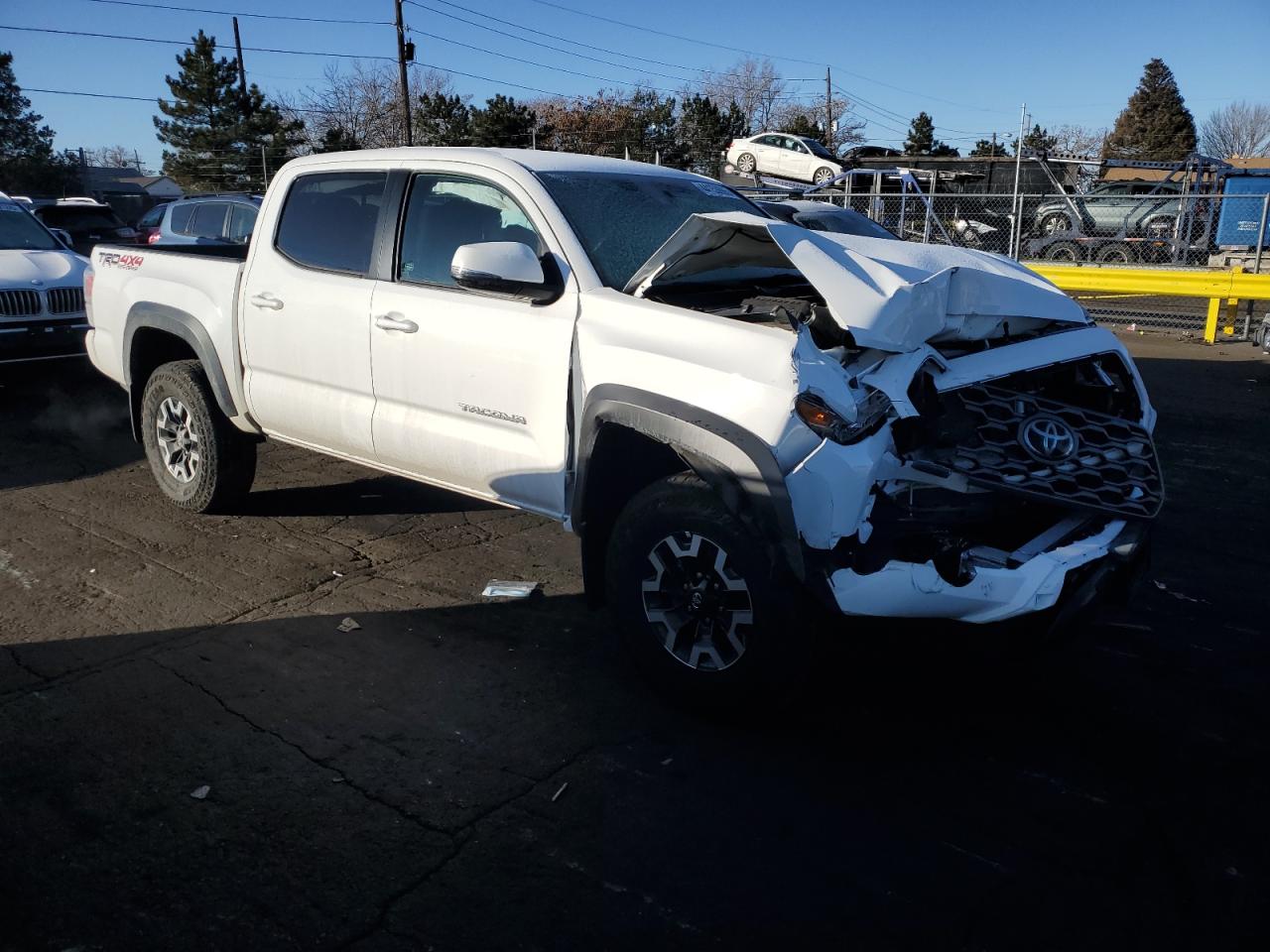 2023 Toyota Tacoma VIN 3TMCZ5AN9PM610741 Copart auction photo, front end damage thumbnail 4