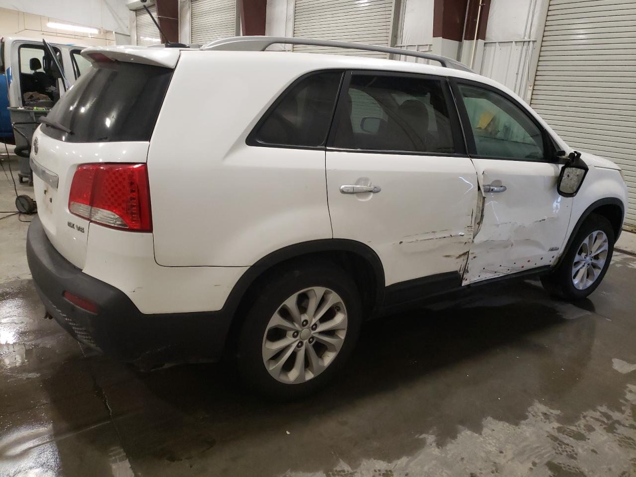 2011 KIA Sorento VIN 5XYKUDA25BG063502 Copart auction photo, side / front end damage thumbnail 3