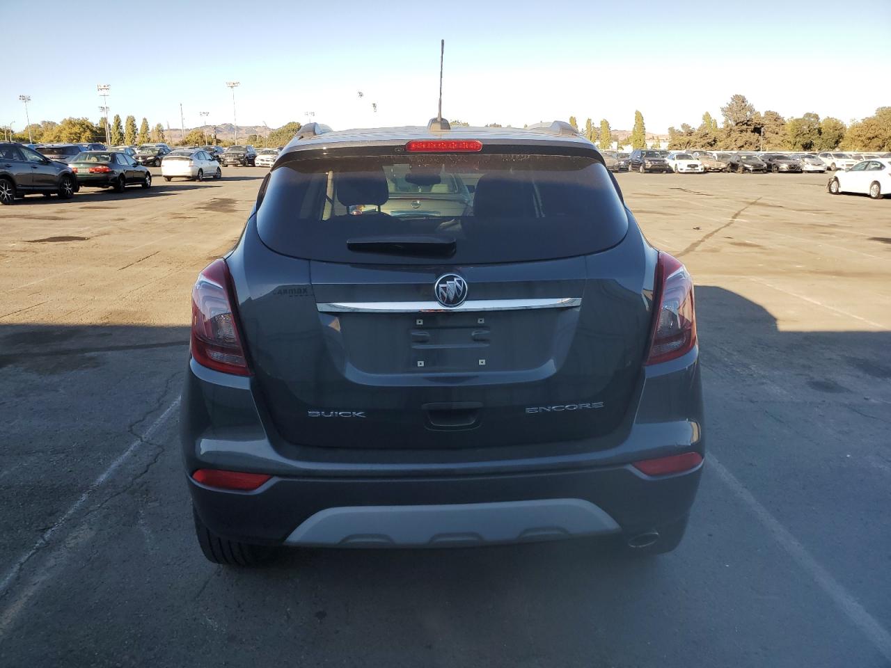 2018 Buick Encore VIN KL4CJASBXJB702907 Copart auction photo, side damage thumbnail 6