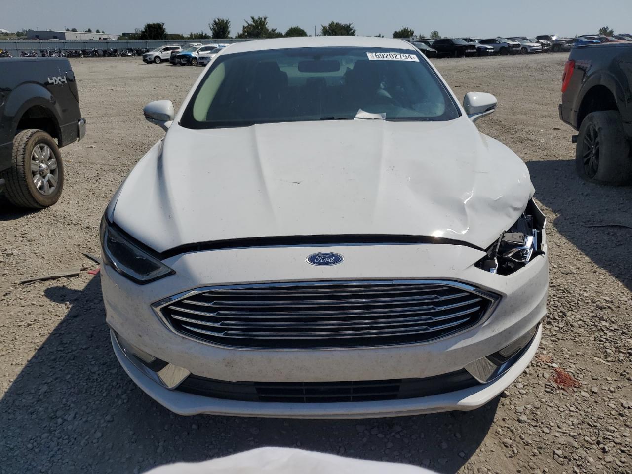2017 Ford Fusion VIN 3FA6P0HDXHR319002 Copart auction photo, front end / side damage thumbnail 5