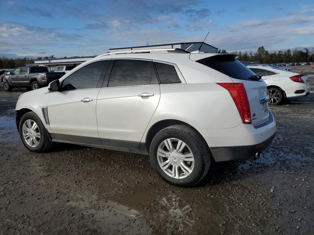 2014 Cadillac SRX VIN 3GYFNCE34ES628136 Copart auction photo, front end damage thumbnail 2