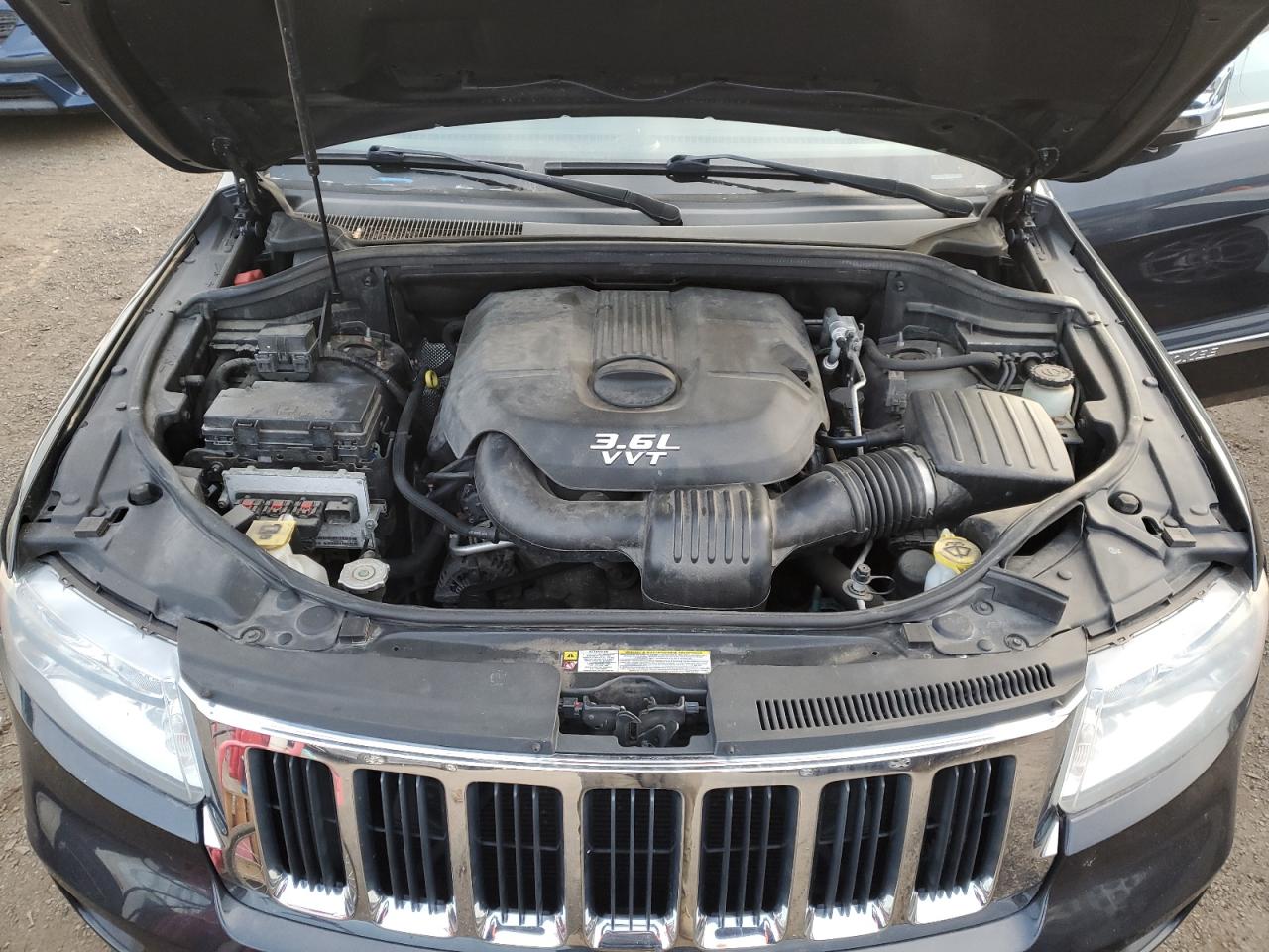 2013 Jeep Grand Cherokee VIN 1C4RJFBG8DC580572 Copart auction photo, minor dent/scratches damage thumbnail 12