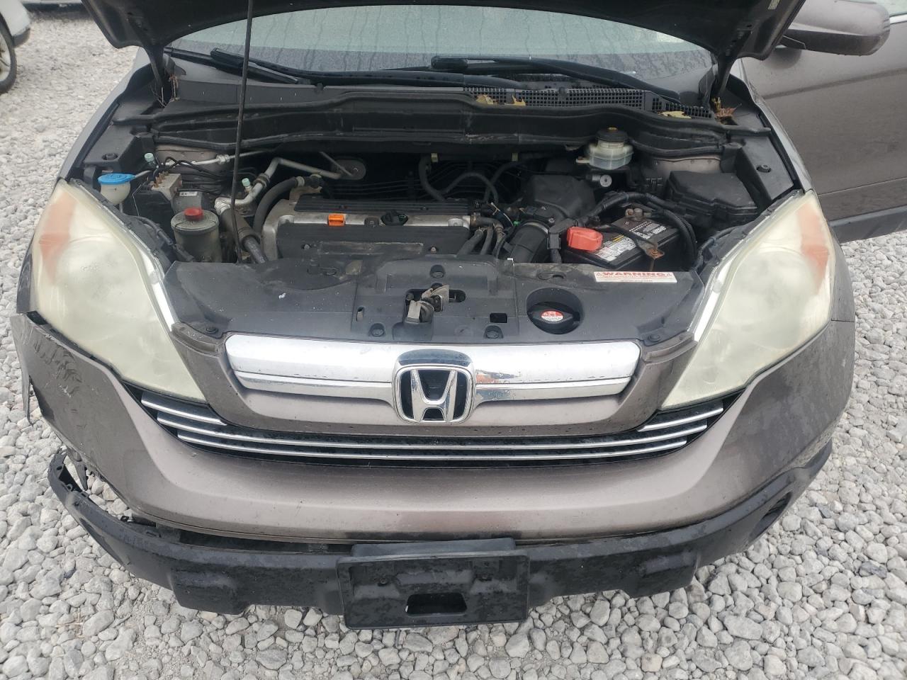 2009 Honda CR-V VIN 5J6RE48769L024990 Copart auction photo, side / front end damage thumbnail 12