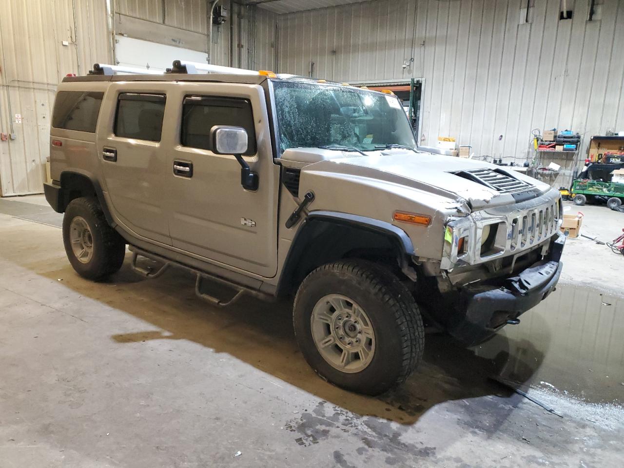 2004 Hummer H2 VIN 5GRGN23U94H110447 Copart auction photo, front end damage thumbnail 4