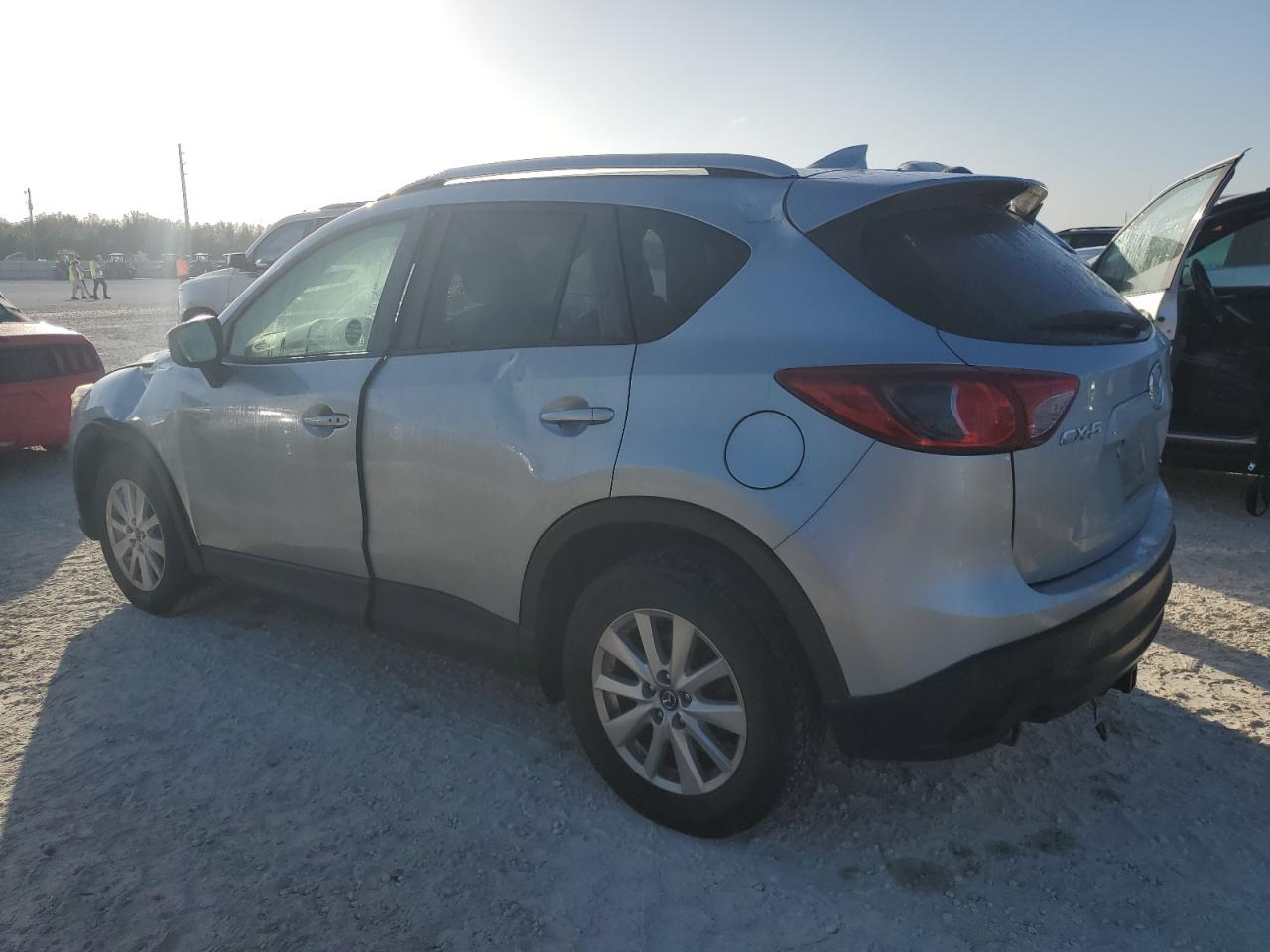 2016 Mazda CX-5 VIN JM3KE2CY4G0638521 Copart auction photo, water/flood damage thumbnail 2