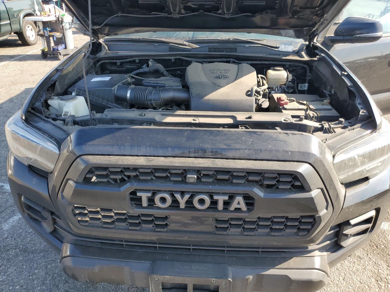 2020 Toyota Tacoma VIN 5TFCZ5AN0LX228859 Copart auction photo, burn / minor dent/scratches damage thumbnail 11
