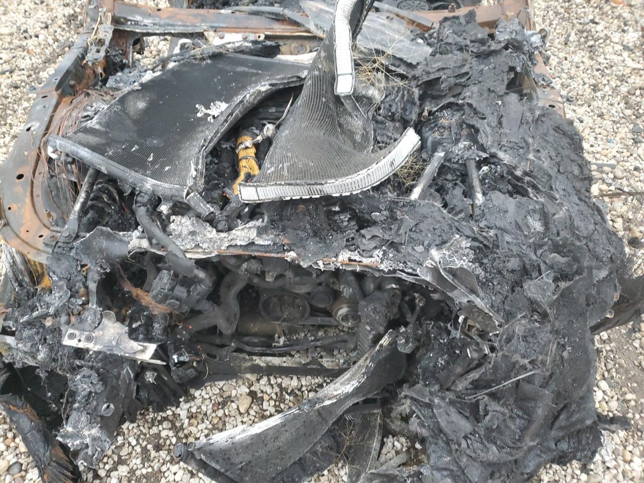 2016 BMW 7er VIN WBA7F2C57GG416660 Copart auction photo, burn damage thumbnail 11
