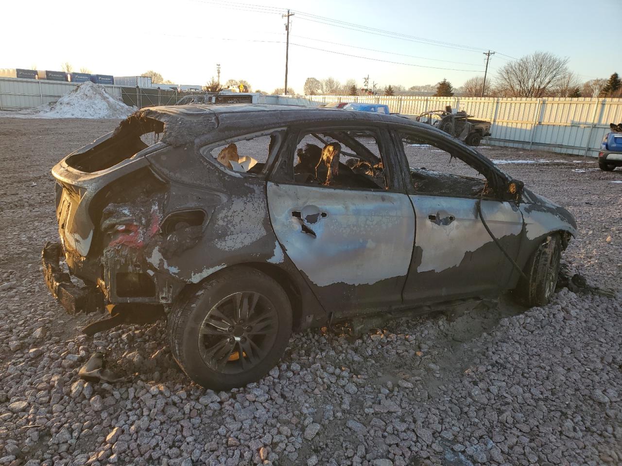 2012 Ford Focus VIN 1FAHP3M26CL362368 Copart auction photo, burn damage thumbnail 3