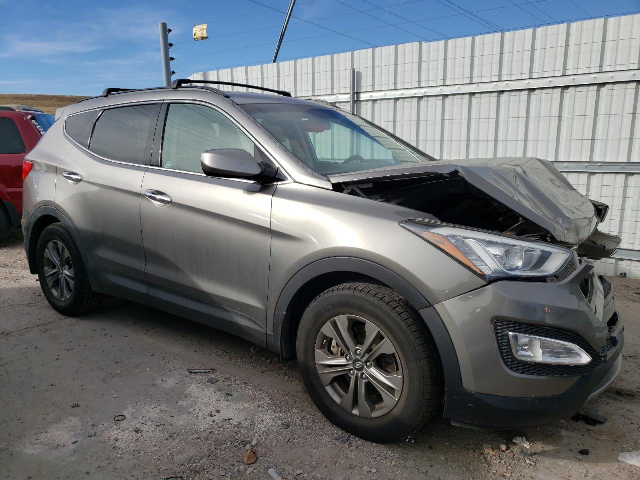 2016 Hyundai Santa Fe VIN 5XYZUDLB8GG373579 Copart auction photo, front end / hail damage thumbnail 4