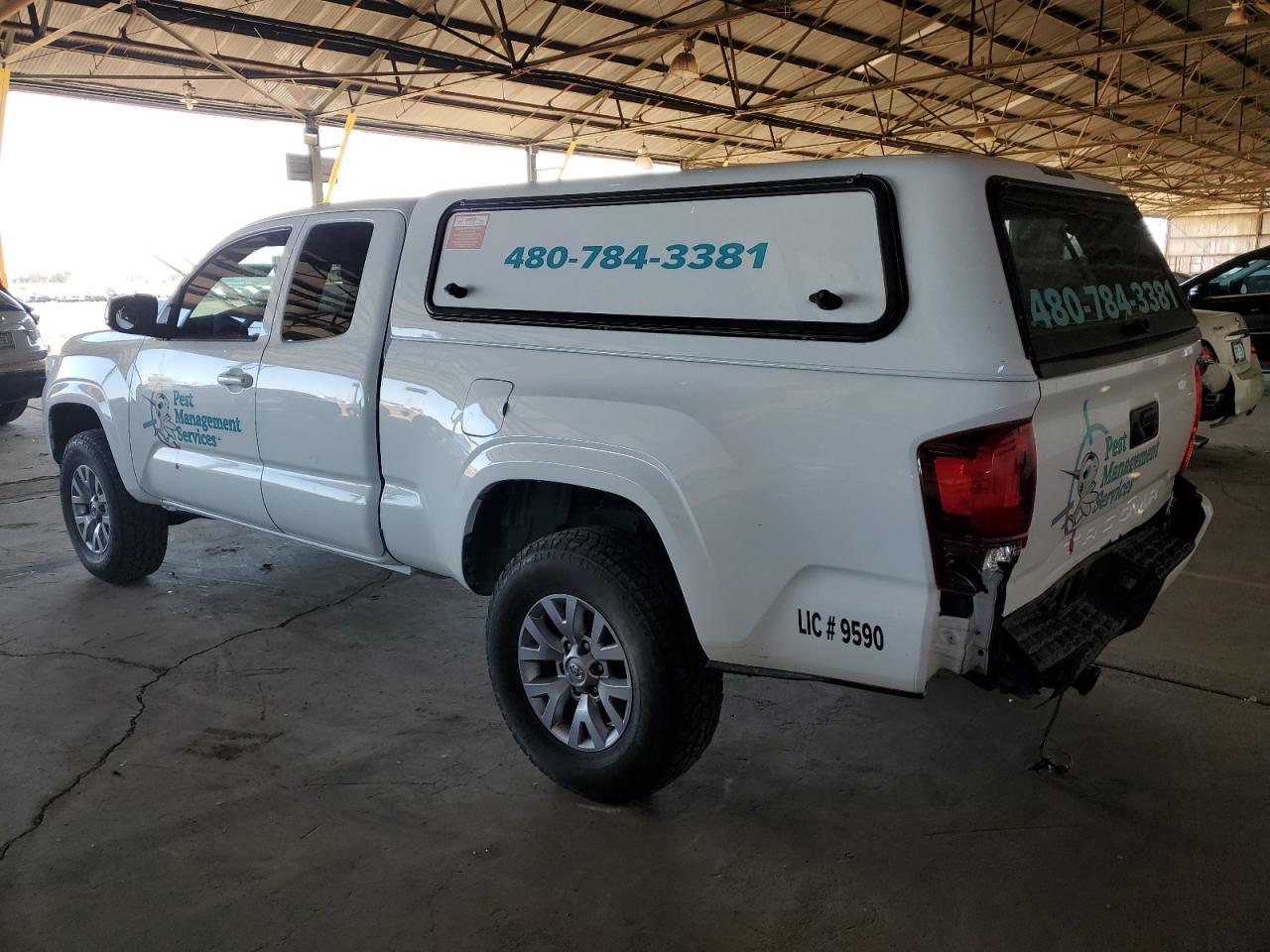 2018 Toyota Tacoma VIN 5TFRX5GN2JX111711 Copart auction photo, rear end / minor dent/scratches damage thumbnail 2