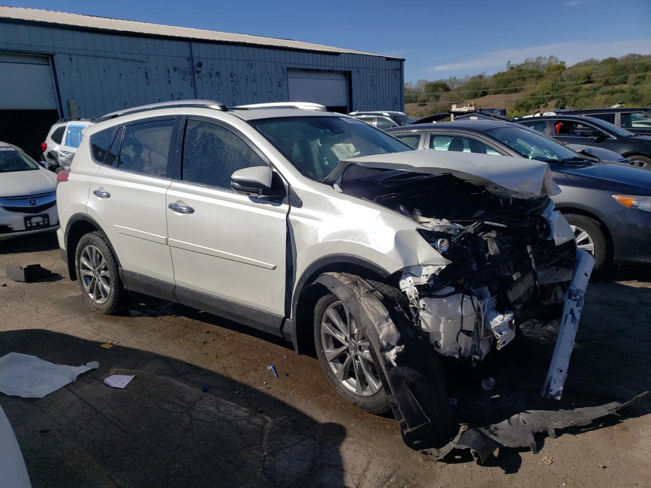 2017 Toyota RAV 4 VIN JTMDFREV1HJ173489 Copart auction photo, front end / side damage thumbnail 4