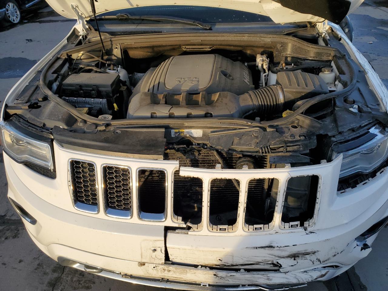 2015 Jeep Grand Cherokee VIN 1C4RJFCT4FC820912 Copart auction photo, front end / side damage thumbnail 12