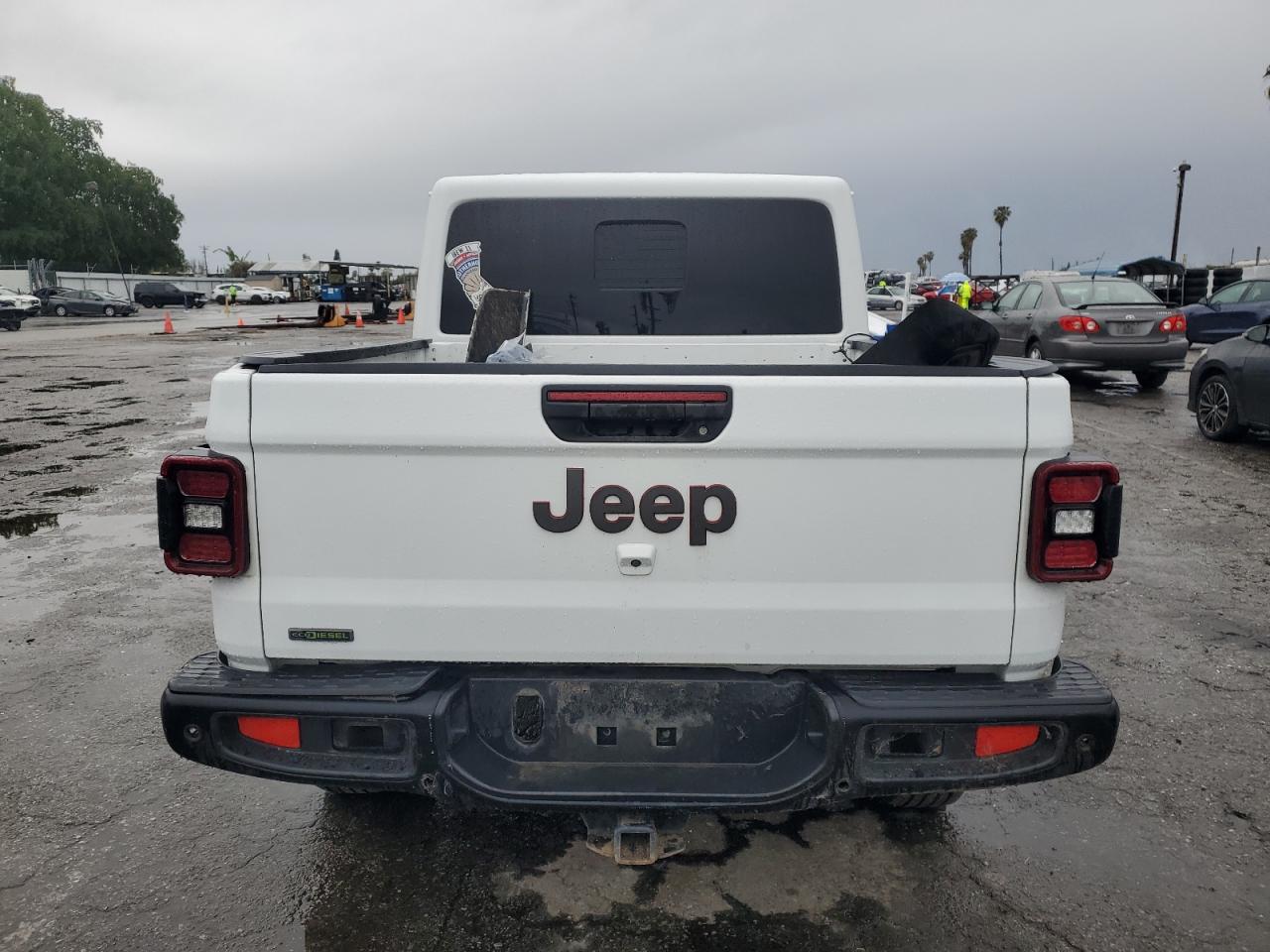 2021 Jeep Gladiator VIN 1C6JJTBM4ML556391 Copart auction photo, front end / undercarriage damage thumbnail 6