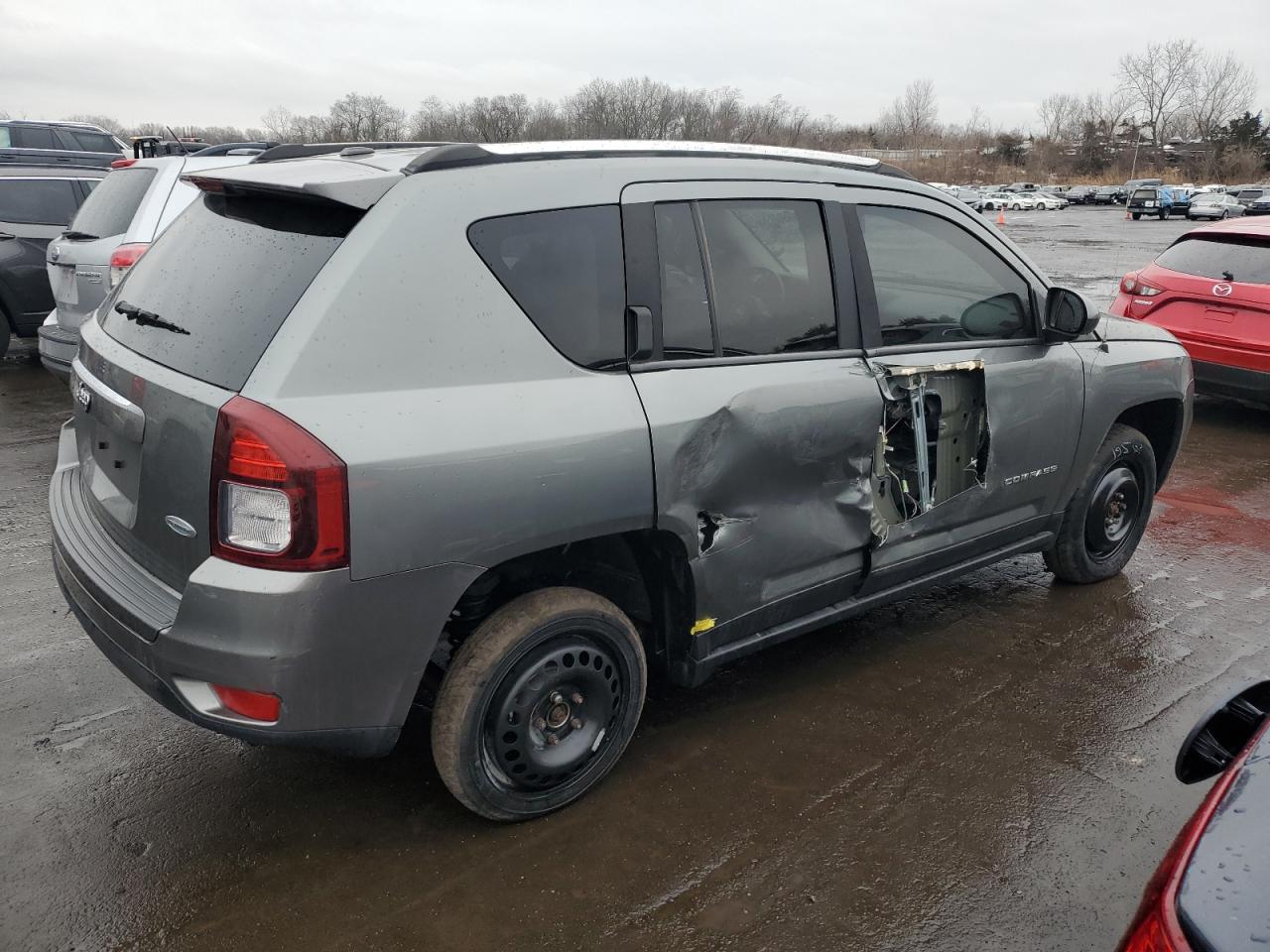 2014 Jeep Compass VIN 1C4NJDEB3ED546943 Copart auction photo, side / minor dent/scratches damage thumbnail 3
