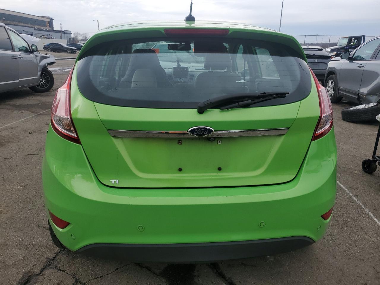 2014 Ford Fiesta VIN 3FADP4FJ4EM114016 Copart auction photo, front end / side damage thumbnail 6