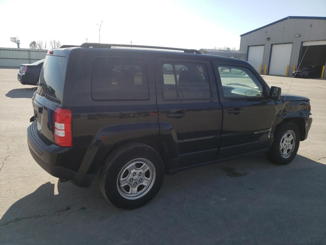 2015 Jeep Liberty (Patriot) VIN 1C4NJPBAXFD235394 Copart auction photo, front end / side damage thumbnail 3