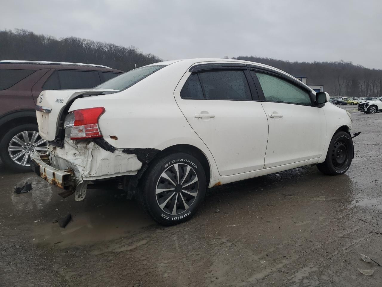 2009 Toyota Yaris VIN JTDBT903891325968 Copart auction photo, front end / rear end damage thumbnail 3