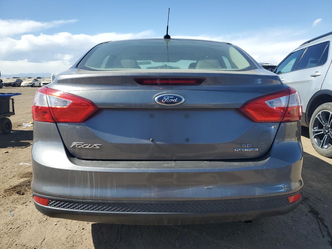 2014 Ford Focus VIN 1FADP3F21EL241584 Copart auction photo, side / front end damage thumbnail 6