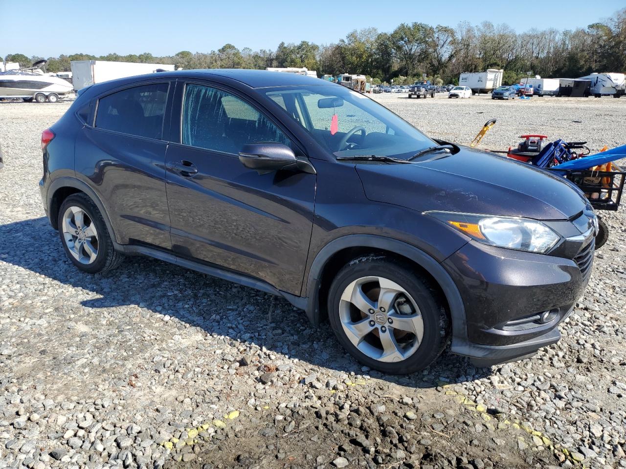 2017 Honda HR-V VIN 3CZRU5H5XHM707084 Copart auction photo, water/flood damage thumbnail 4