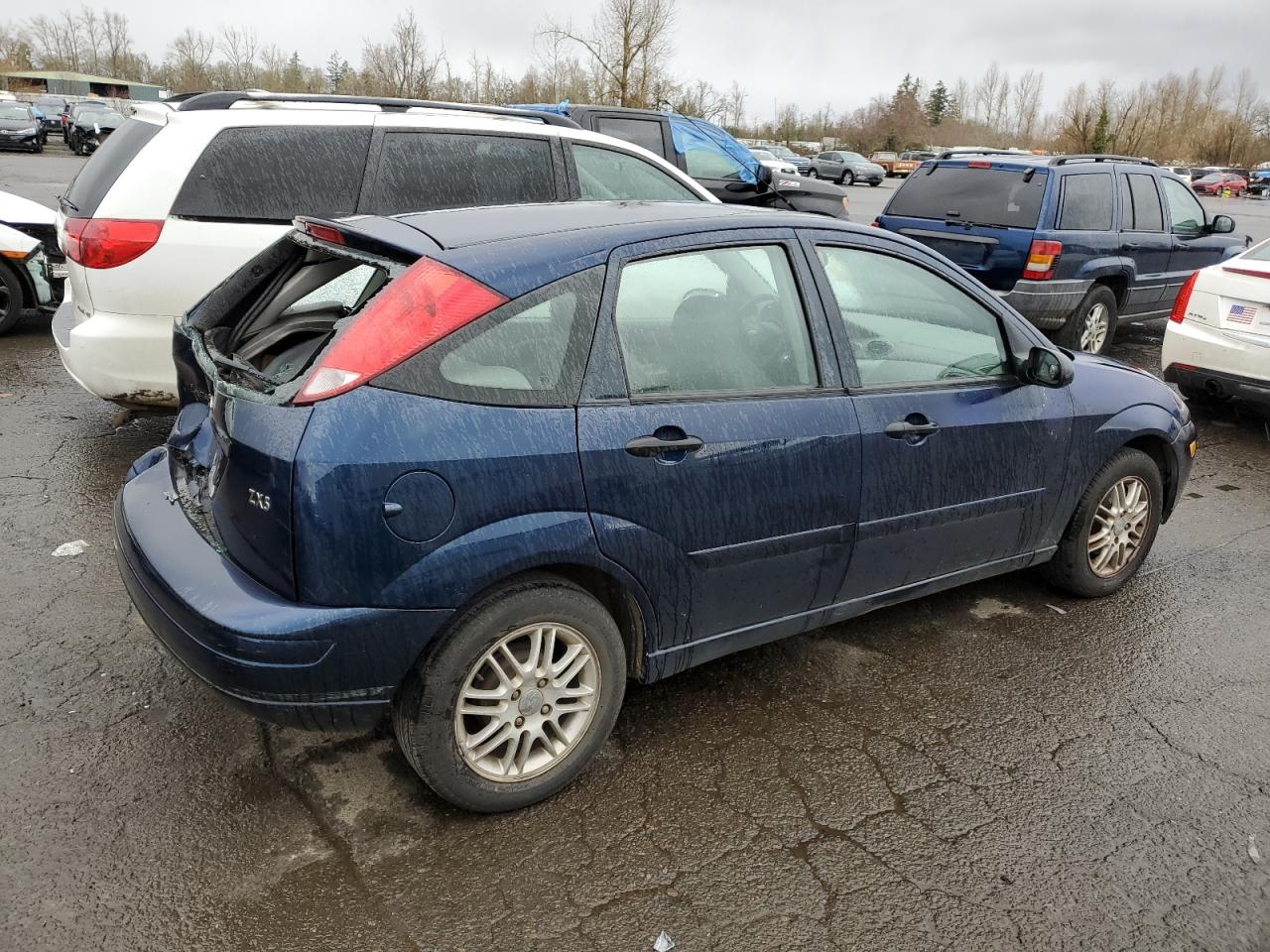 2004 Ford Focus VIN 3FAFP37344R103019 Copart auction photo, rear end damage thumbnail 3