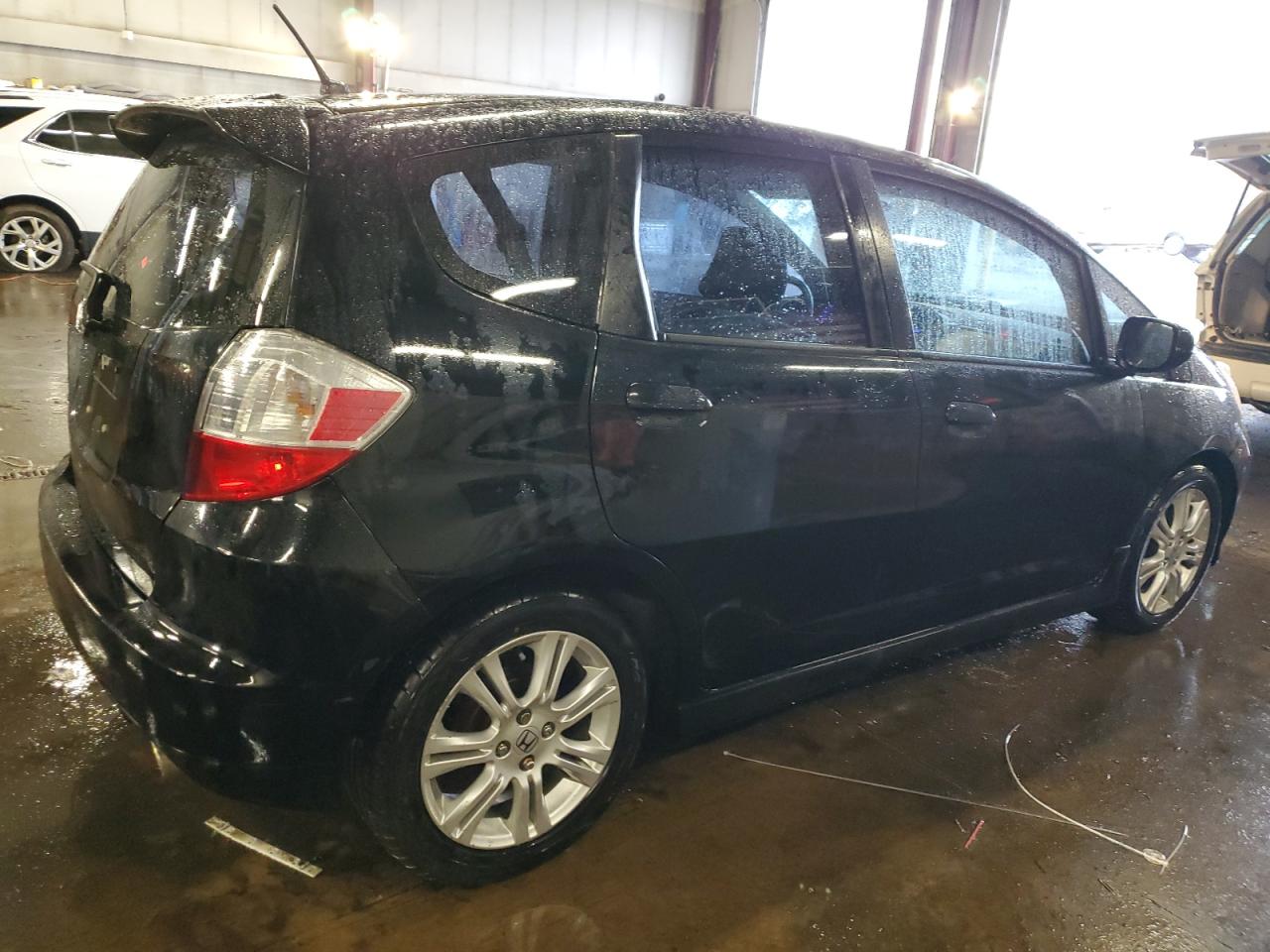 2009 Honda Fit VIN JHMGE88489S060839 Copart auction photo, rear end / side damage thumbnail 3