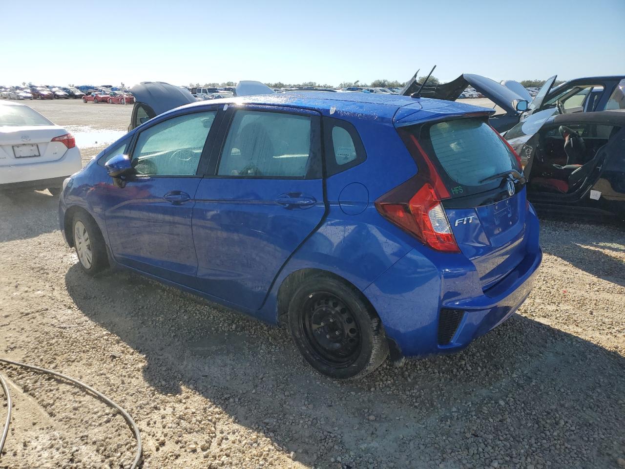 2015 Honda Fit VIN 3HGGK5G5XFM718525 Copart auction photo, water/flood damage thumbnail 2