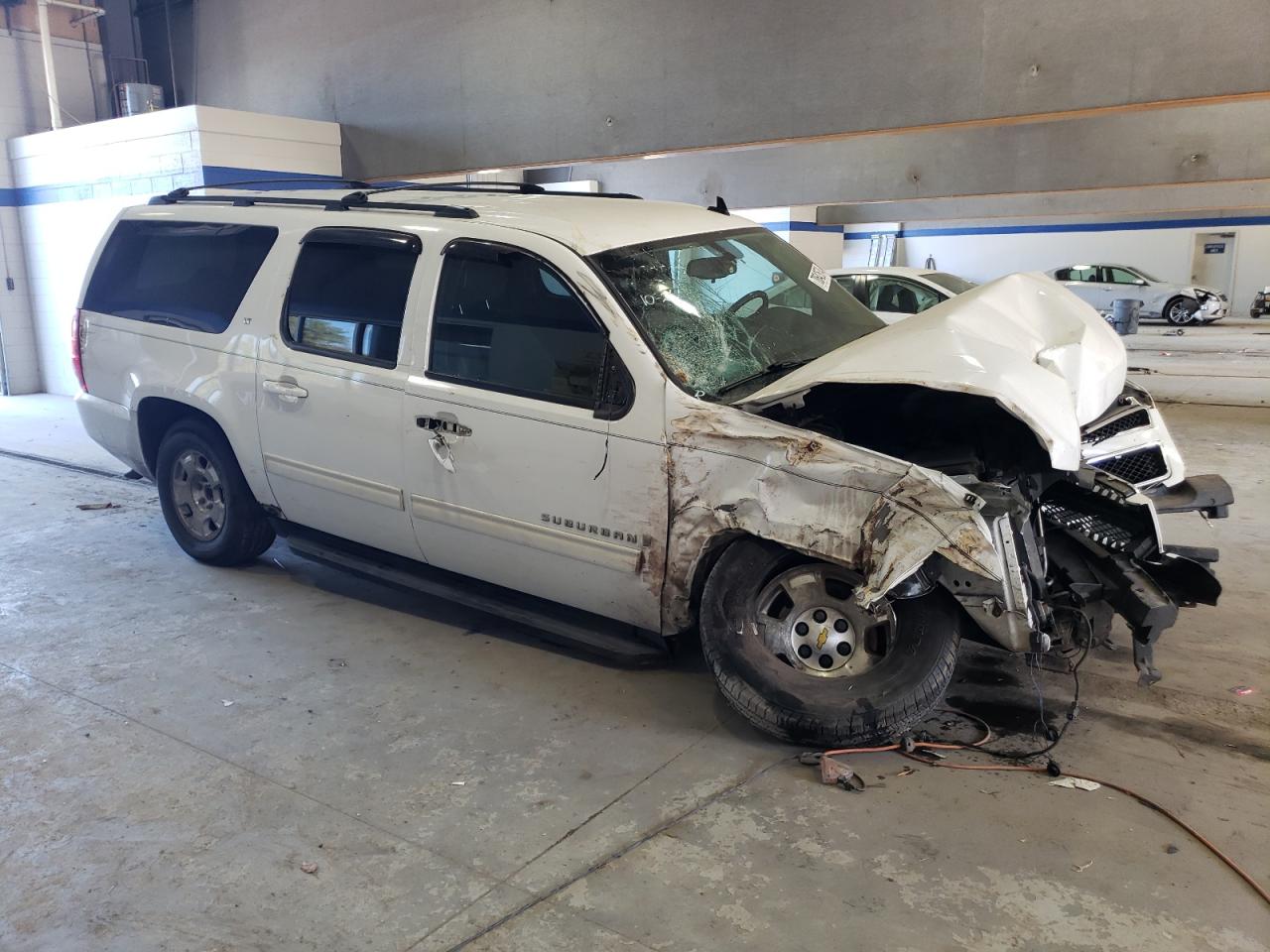 2009 Chevrolet Suburban VIN 1GNFK26389R272863 Copart auction photo, front end / undercarriage damage thumbnail 4