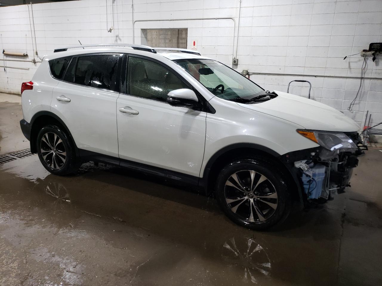 2015 Toyota RAV 4 VIN JTMDFREV2FD105116 Copart auction photo, front end / rear end damage thumbnail 4