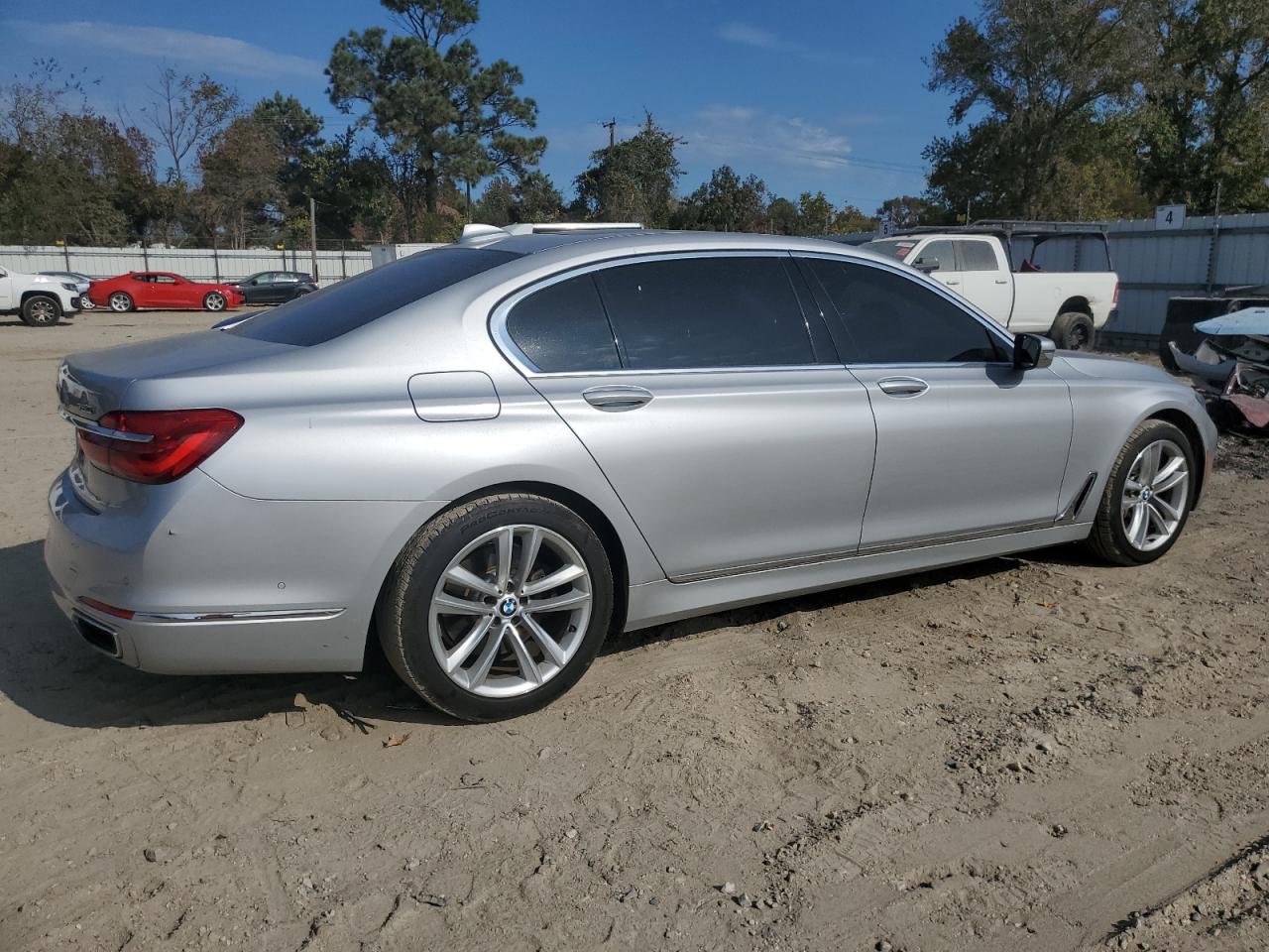 2016 BMW 7er VIN WBA7F0C50GGM20697 Copart auction photo, minor dent/scratches damage thumbnail 3