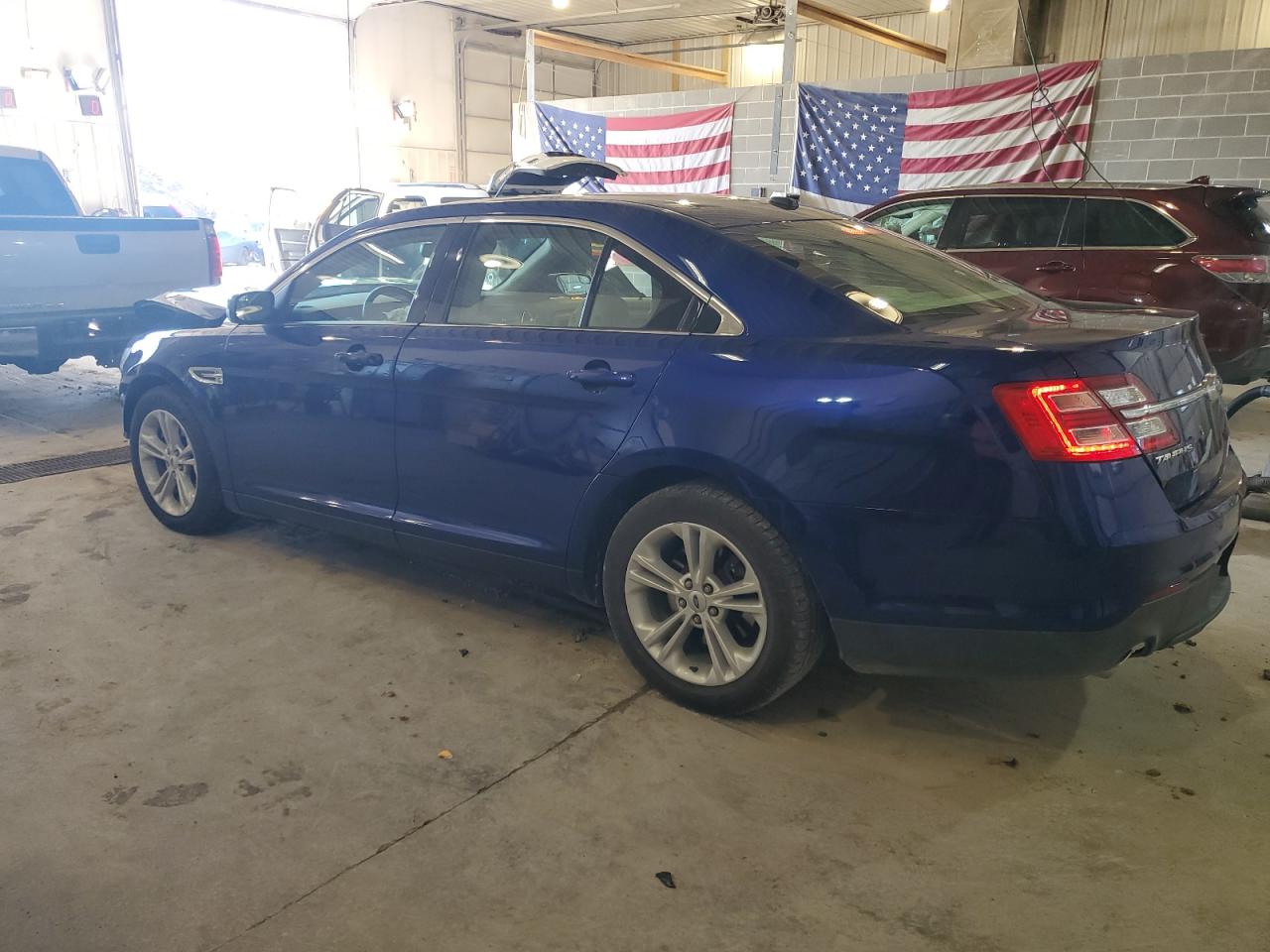 2014 Ford Taurus VIN 1FAHP2E88EG141993 Copart auction photo, front end damage thumbnail 2