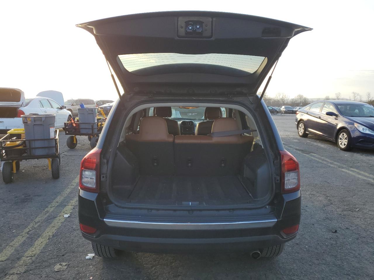 2016 Jeep Compass VIN 1C4NJDEB0GD785501 Copart auction photo, front end / side damage thumbnail 6
