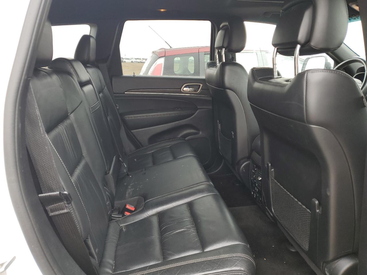 2015 Jeep Grand Cherokee VIN 1C4RJFBG9FC680148 Copart auction photo, rear end / undercarriage damage thumbnail 11