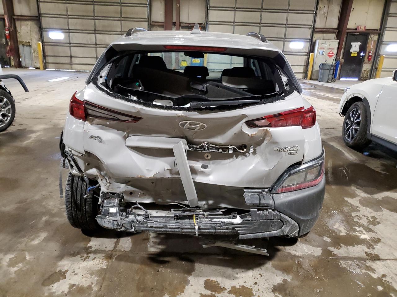 2022 Hyundai Kona VIN KM8K6CAB3NU910584 Copart auction photo, rear end / minor dent/scratches damage thumbnail 6